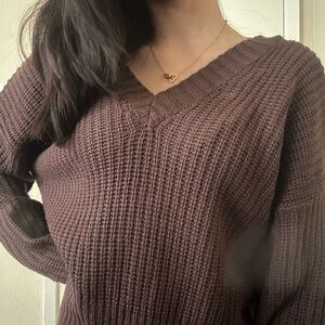 Brown V-neck sweater